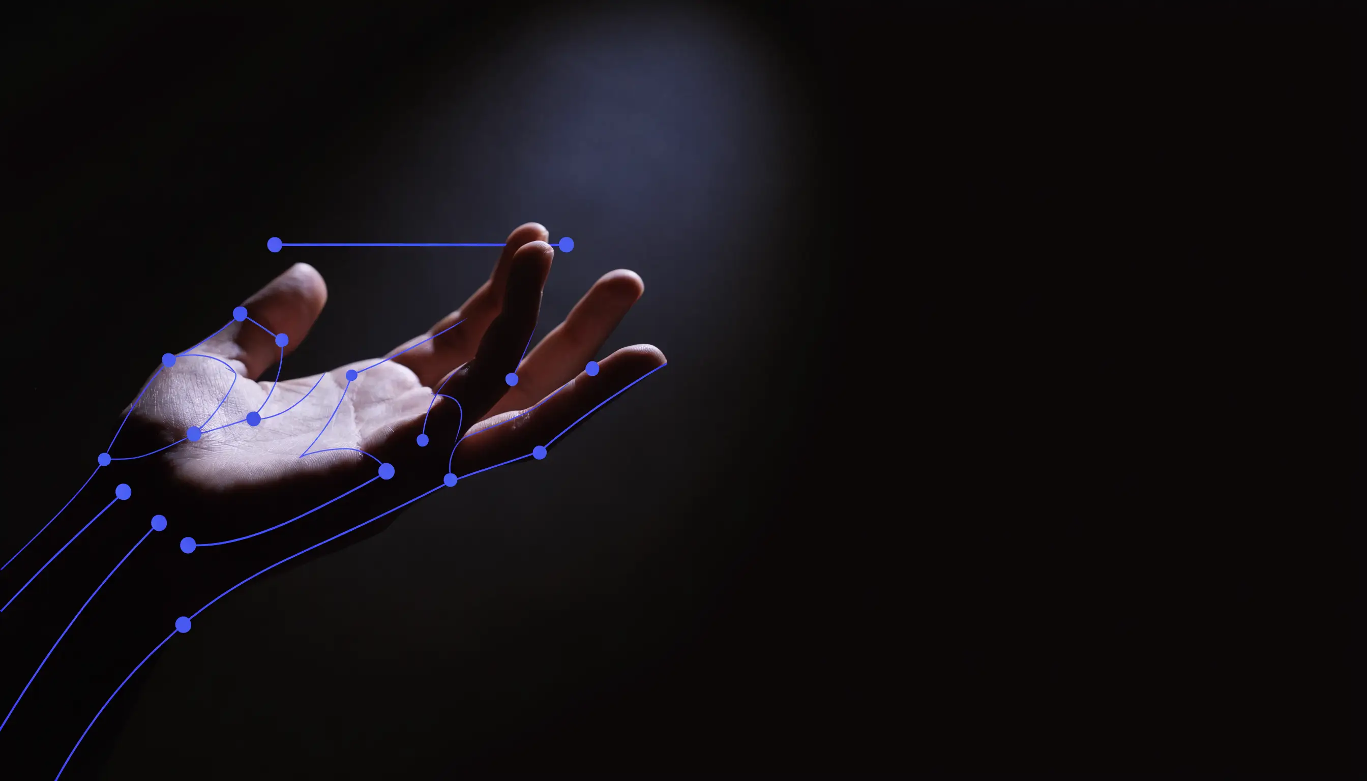 A hand with an electric-blue measurement overlay, representing precision fit